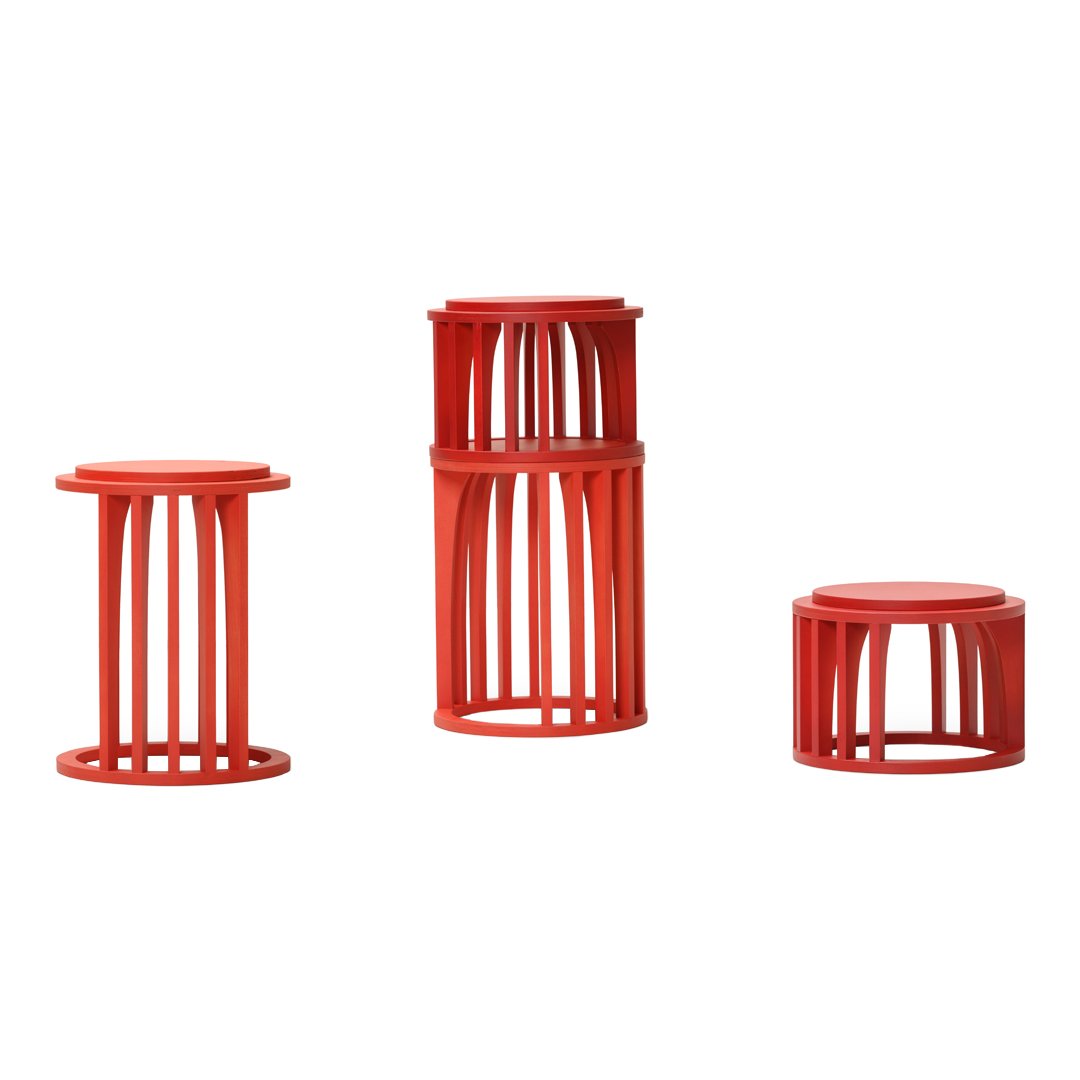Set of three modern red stools with open lattice design, featuring a vibrant, contemporary color scheme.