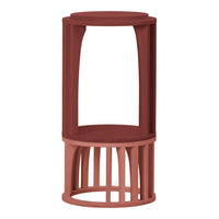 Rust-colored cylindrical stool with vertical slats and a smooth top surface. Modern design ideal for contemporary decor.