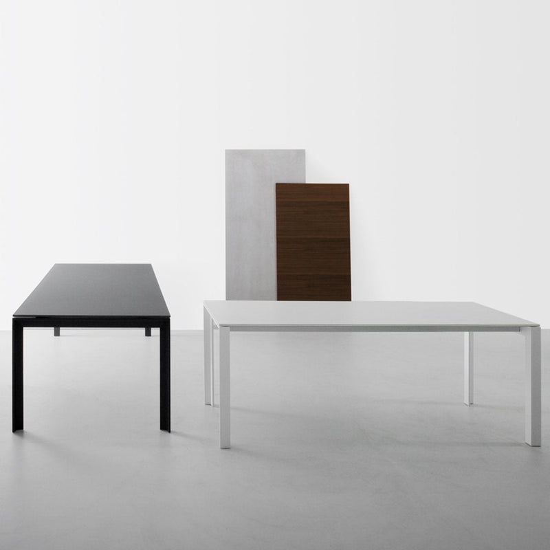 Modern furniture set featuring black, white, and natural wood colors with sleek, minimalistic patterns.