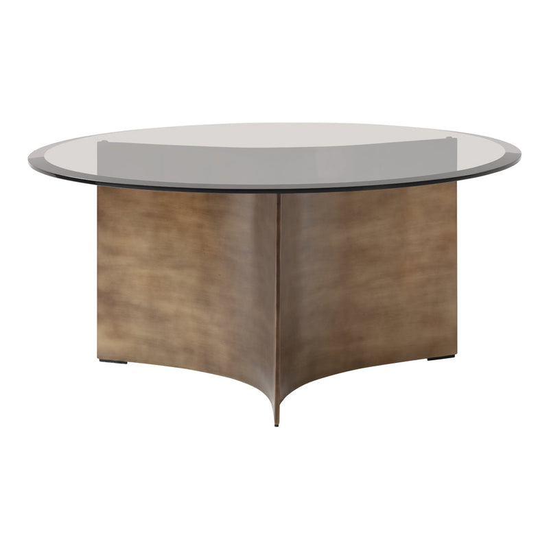Round glass-top coffee table with a sleek, bronze metallic base, featuring a smooth, modern design and neutral tones.
