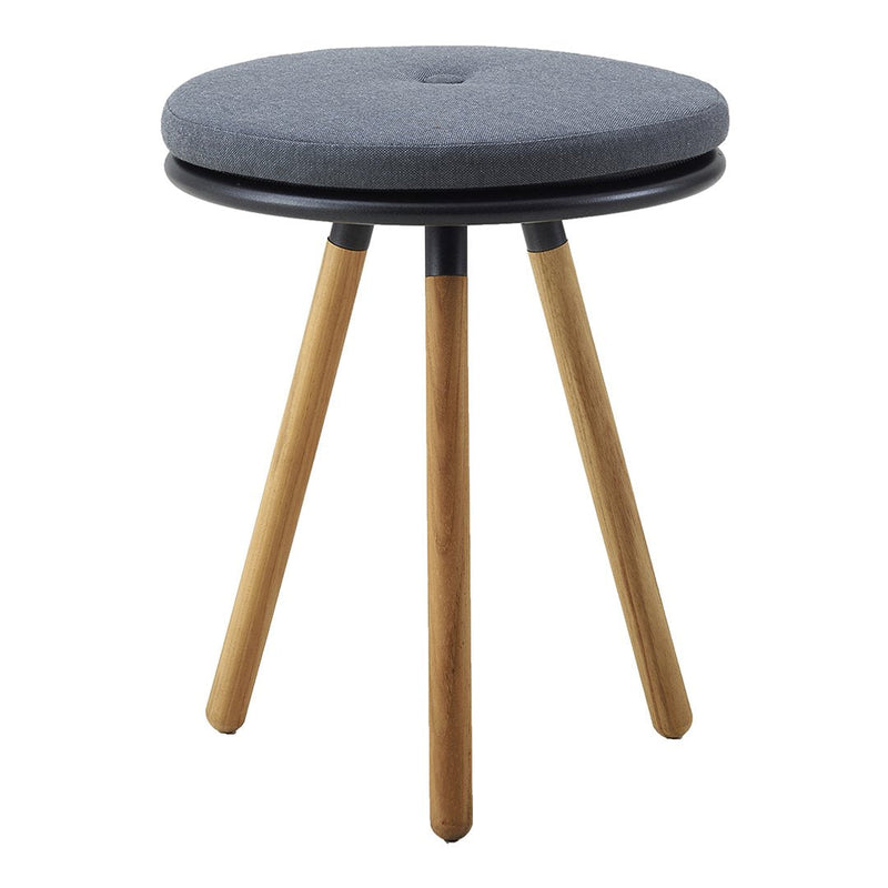 Gray upholstered stool with a round top and natural wood legs, showcasing a modern minimalist design.
