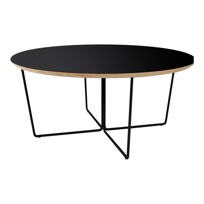 Black circular tabletop with natural wood edge and geometric black metal legs. Modern and elegant design.