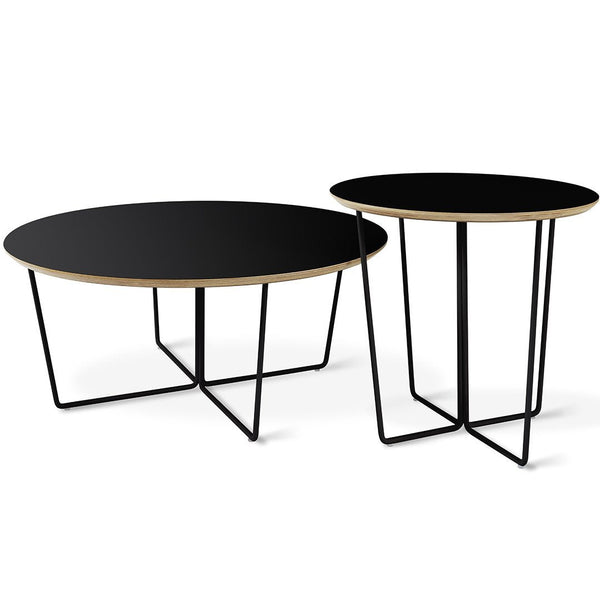 Set of two modern round tables with sleek black tops and natural wood edges, featuring minimalist black metal legs.