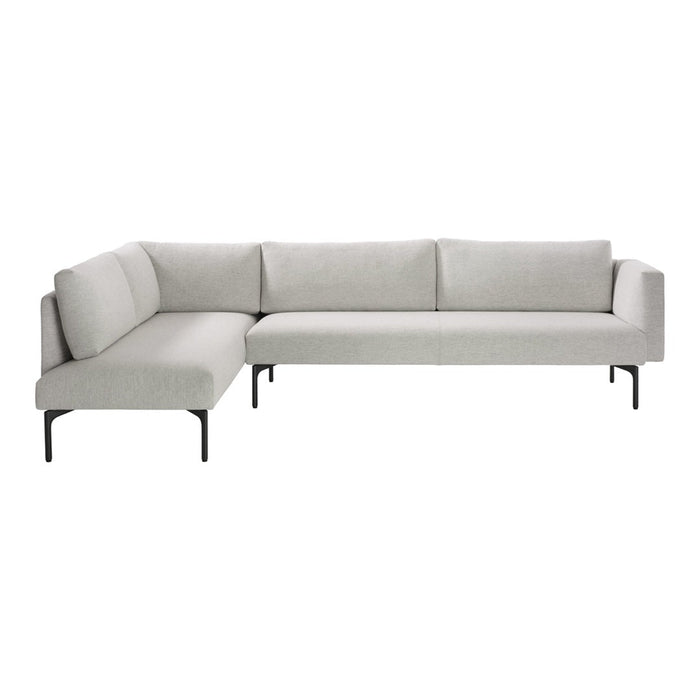 Light grey sectional sofa with clean lines and a minimalist design, featuring soft fabric upholstery and sleek black legs.