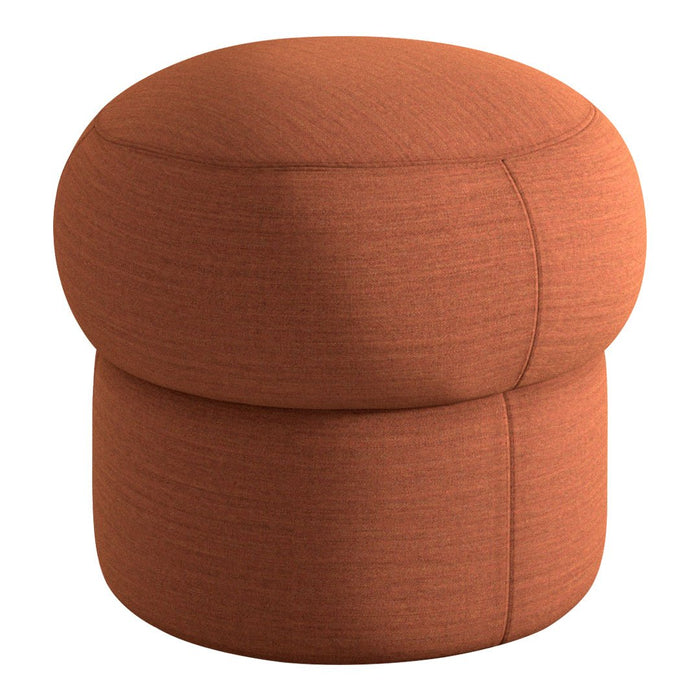 Terra cotta round pouf with textured fabric and stitched detailing, perfect for stylish decor.