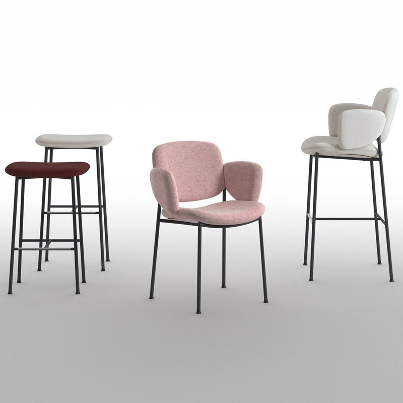Set of four stylish bar stools featuring pink, white, and burgundy padded seats with sleek black legs.