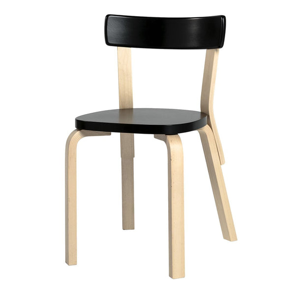 Black and natural wood chair with a minimalistic design and smooth surfaces, perfect for modern decor.