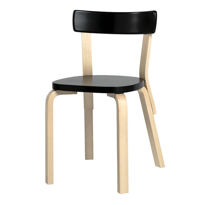 Black and natural wood chair with a minimalistic design and smooth surfaces, perfect for modern decor.