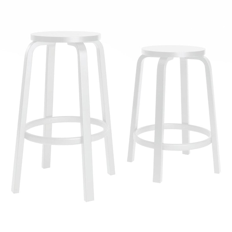 Two sleek, minimalist bar stools in a bright white finish with smooth circular tops and classic leg design.