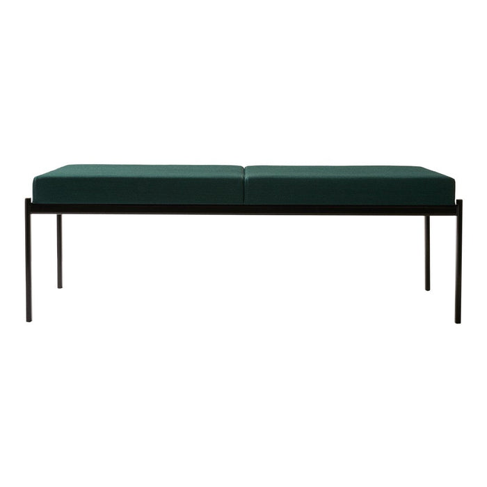 Green upholstered bench with a sleek black metal frame, featuring a minimalist, modern design.