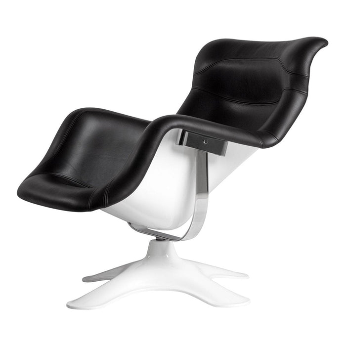 Black and white modern lounge chair with sleek leather finish and contemporary chrome base. Elegant and stylish design.