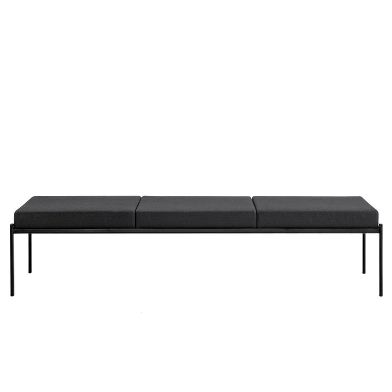 Black minimalist bench with a smooth, sleek design and three cushion sections on a sturdy metal frame.