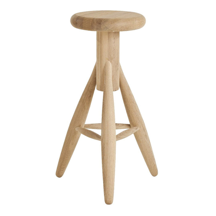 Natural wood stool with a smooth, light finish and minimalist design featuring tapered legs.