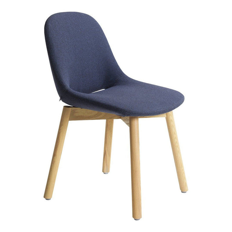 Navy blue upholstered chair with smooth curves and natural wooden legs, perfect for modern decor.