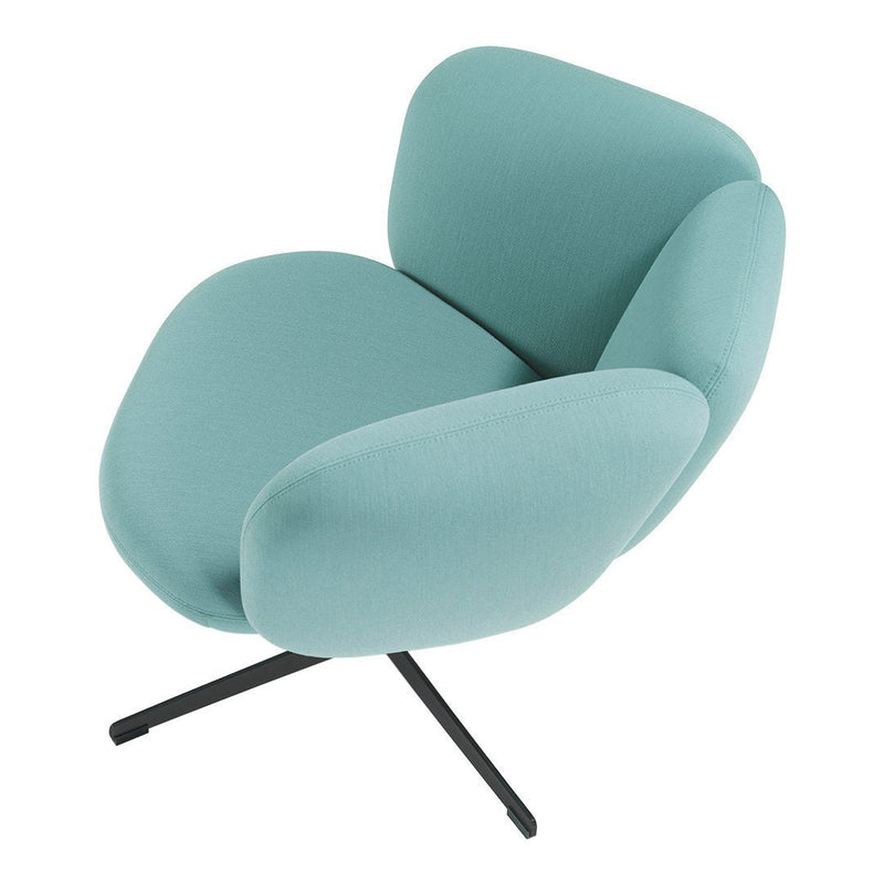Light blue chair with smooth, rounded cushions and a modern black base, perfect for contemporary decor.