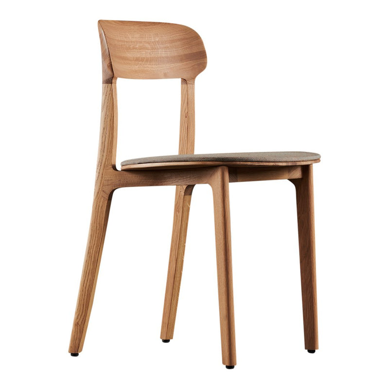 Natural wood chair in warm brown tones with smooth, minimalist design and subtle grain pattern.