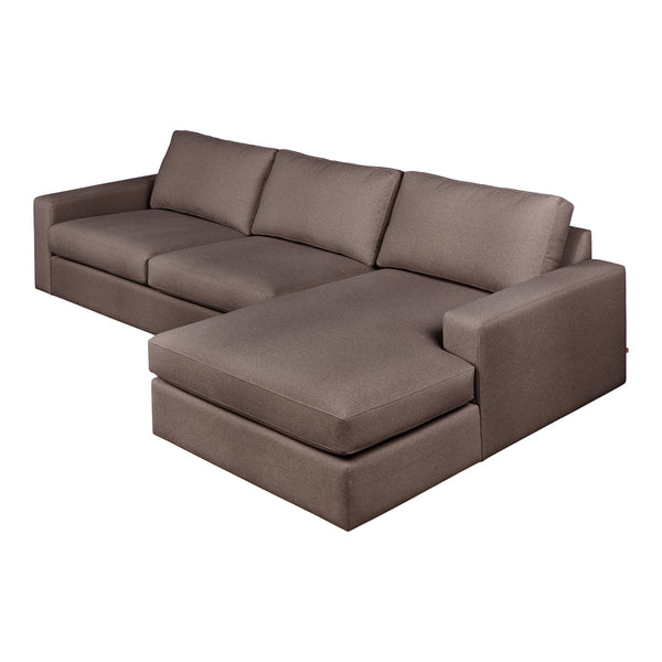 "Modern L-shaped sofa in neutral brown fabric with clean lines and no visible patterns."