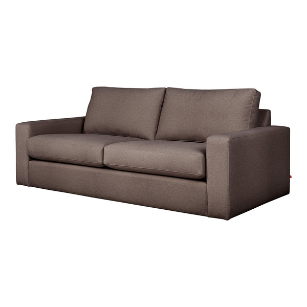 Brown fabric sofa with a smooth texture and clean, modern design. Ideal for contemporary living spaces.