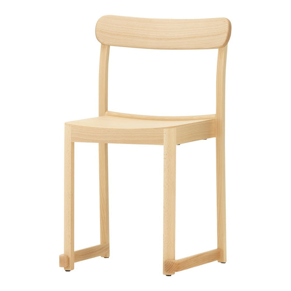 Natural wood chair with a light, minimalist design and smooth, unblemished finish. Ideal for modern interiors.