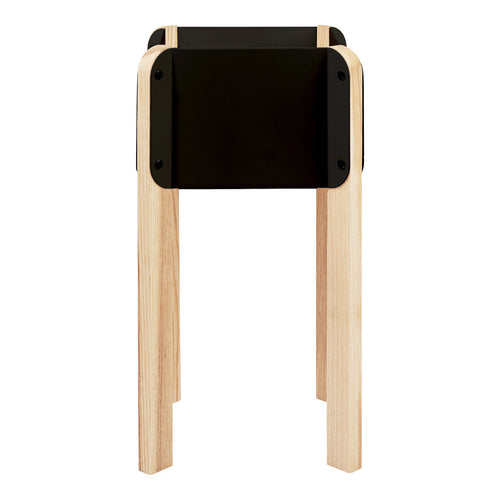 Black tabletop with natural wood legs, featuring a sleek, modern design and minimalistic style.