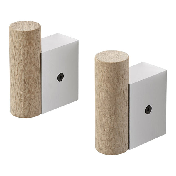 Natural wood and sleek white design, featuring a cylindrical wooden element paired with a modern rectangular block.