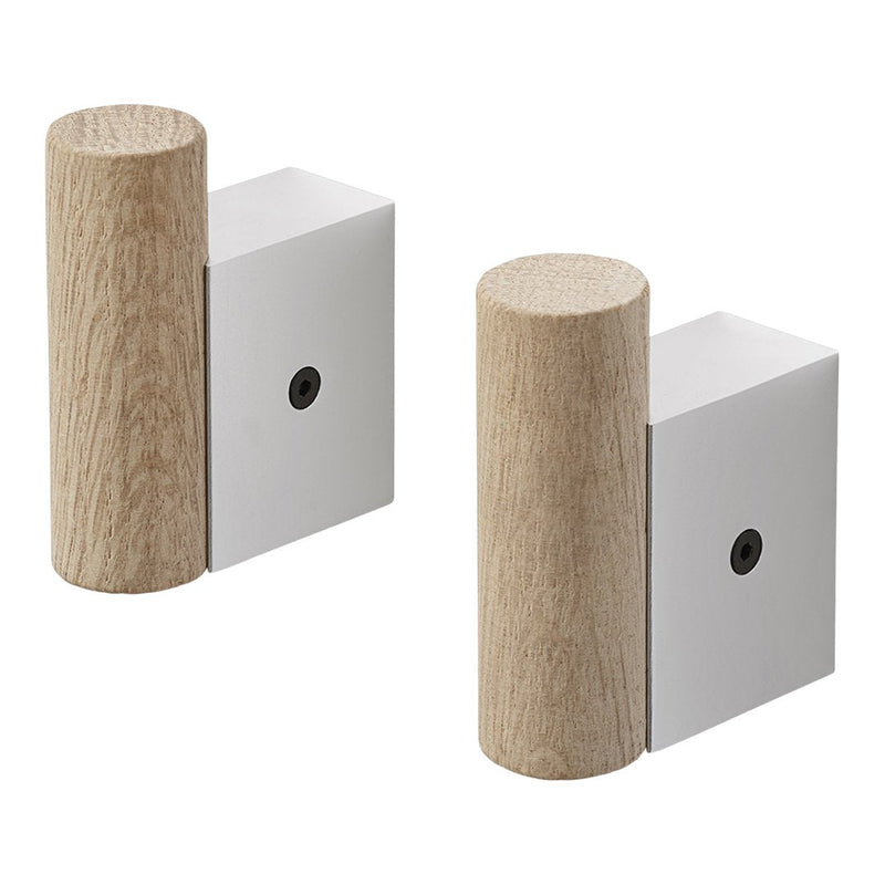 Natural wood and sleek white design, featuring a cylindrical wooden element paired with a modern rectangular block.