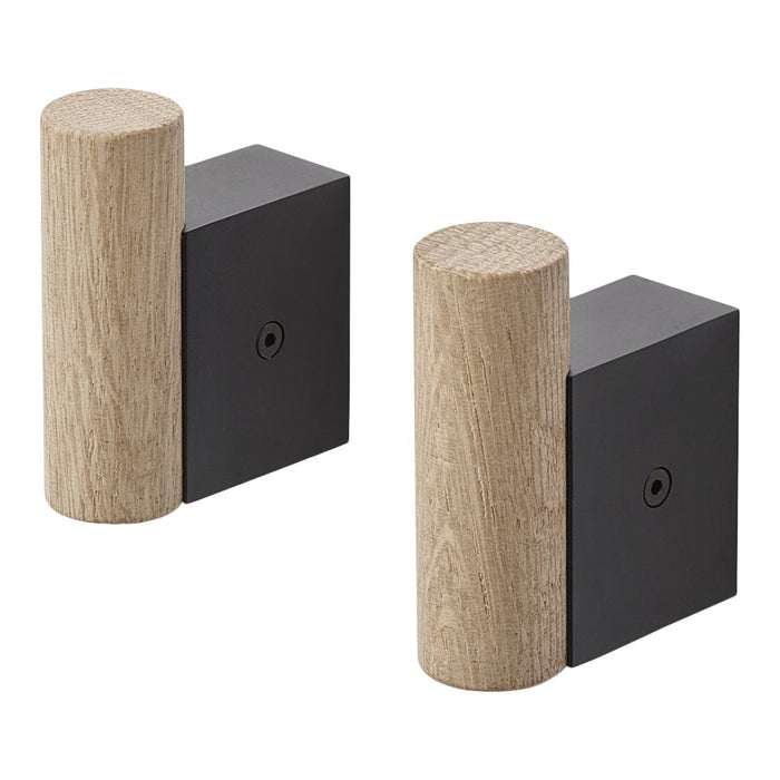 Natural wood grain paired with sleek black metal, featuring a geometric design. Ideal for modern decor accents.