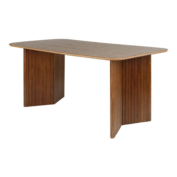Wooden dining table with a warm brown hue and ribbed side pattern, offering a modern aesthetic for any space.