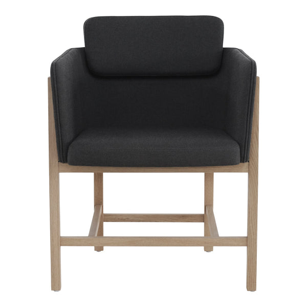 Stylish black upholstered armchair with a light wood frame, featuring a minimalist design.