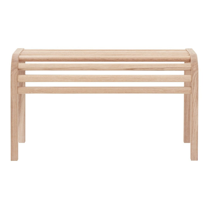 Light oak wooden bench with a minimalist design, featuring smooth lines and a natural wood grain pattern.