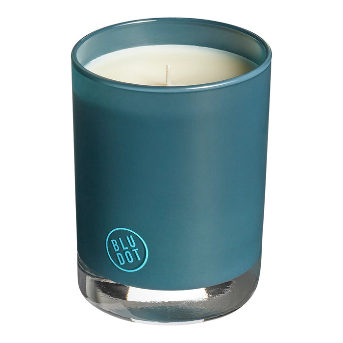 Teal candle holder with a matte finish and shiny silver base, featuring a minimalistic design.
