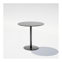 Black round table with a sleek surface and minimalist design, featuring a smooth finish and a circular base.