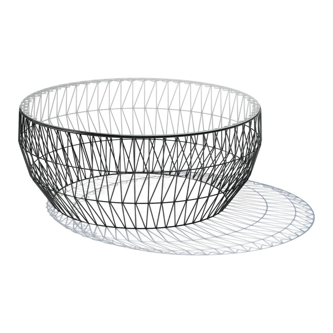 Black wire mesh bowl with geometric pattern and sleek, modern design. Shadow creates subtle depth underneath.