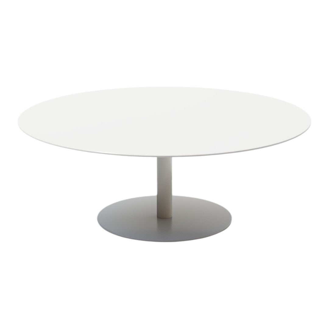 Round white coffee table with a sleek, minimalistic design and a smooth, polished finish on a circular base.