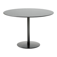 Modern round table in sleek black with a minimalistic design, featuring a smooth finish and a simple base.