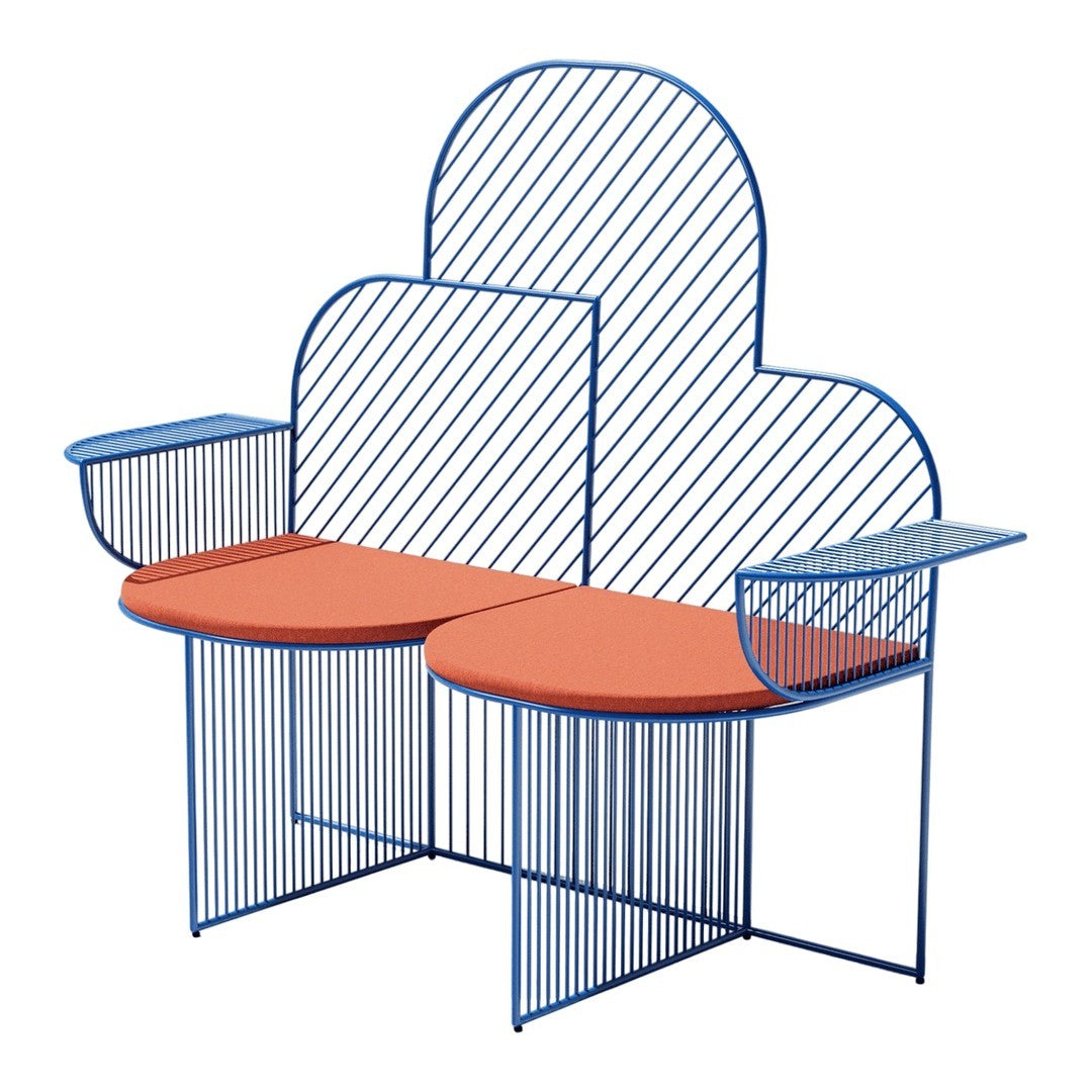 Blue striped wire frame loveseat with orange round cushions and sleek modern design. Perfect for vibrant outdoor spaces.