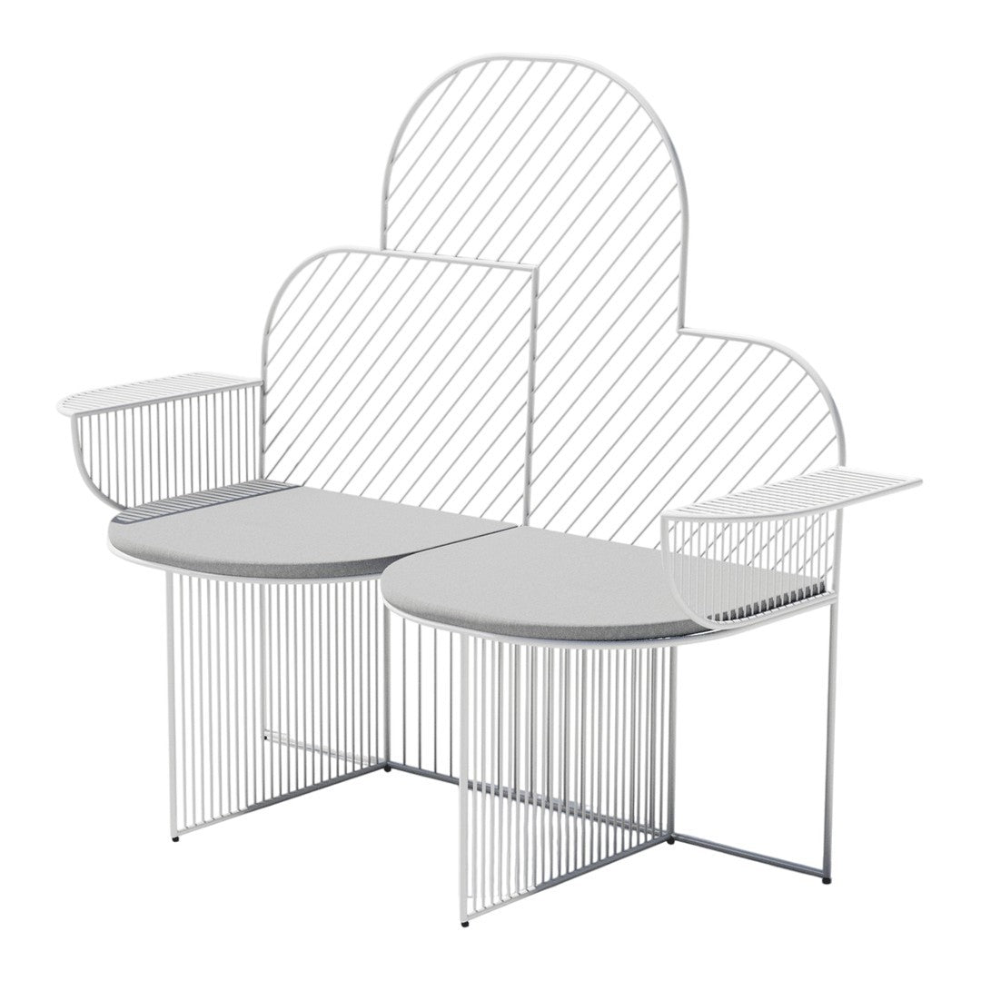 Modern white metal bench with a cloud-shaped back and striped pattern for a contemporary look.