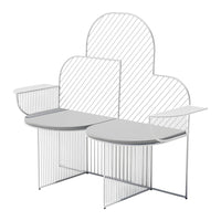 Modern white metal bench with a cloud-shaped back and striped pattern for a contemporary look.