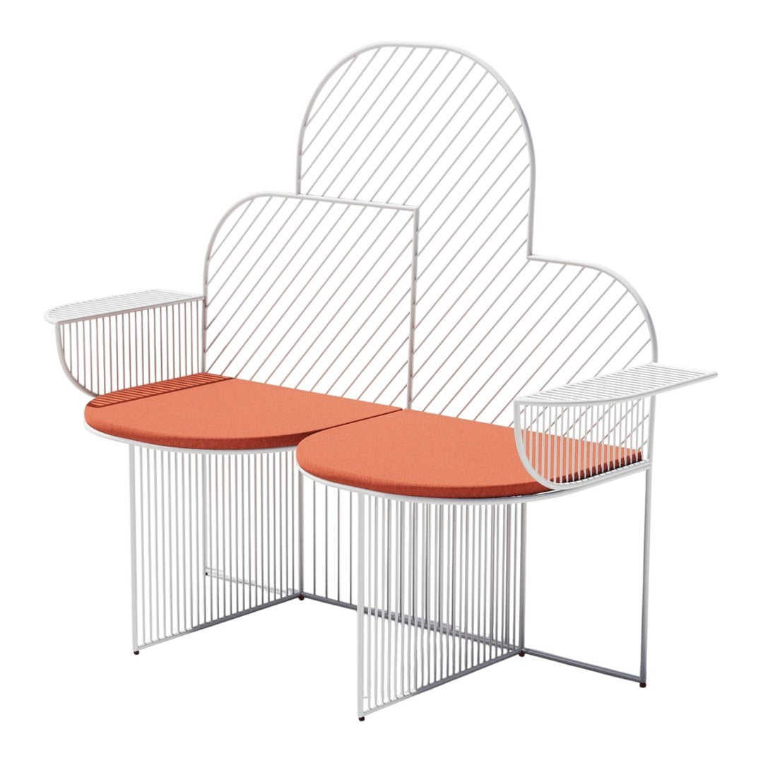 Modern bench featuring a white geometric frame and vibrant orange circular seats for a stylish accent.