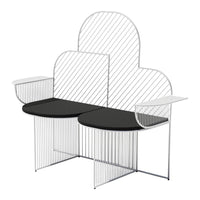 Modern white wireframe bench with a black top and geometric striped pattern. Ideal for stylish outdoor spaces.