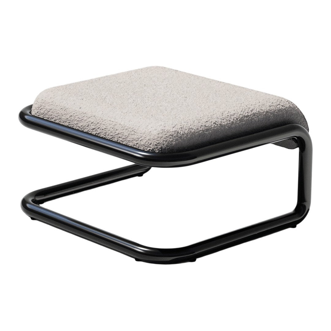 Modern black metal footrest with a textured beige cushion, featuring a sleek and minimalist design.