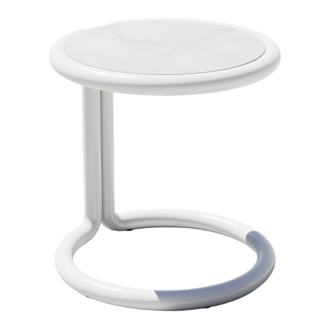 White modern side table with a smooth round top and sleek curved base. Minimalist design, perfect for any decor.