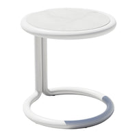 White modern side table with a smooth round top and sleek curved base. Minimalist design, perfect for any decor.