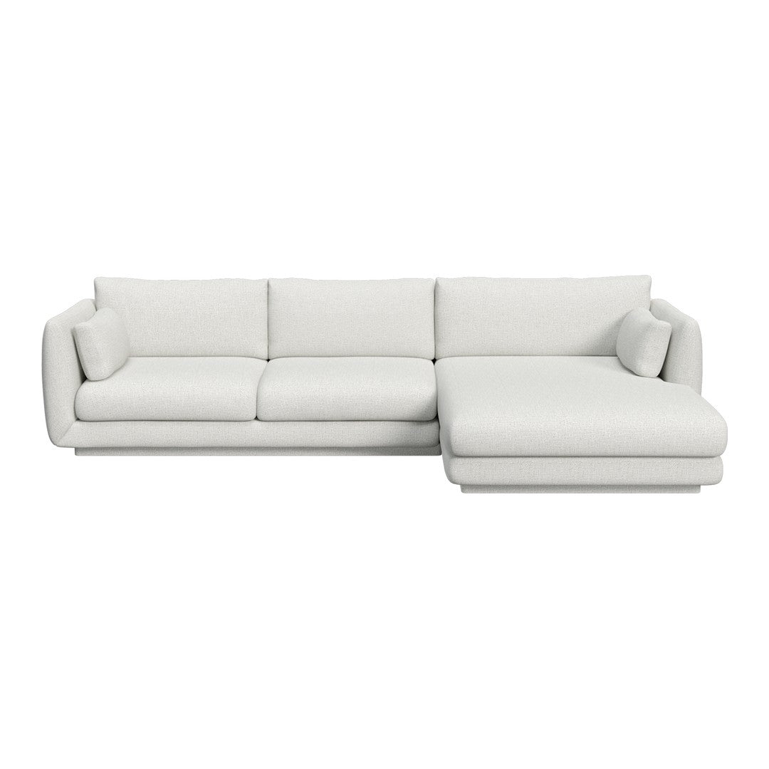 Light gray modern sectional sofa with a smooth, minimalist design and plush cushions. Perfect for contemporary living spaces.