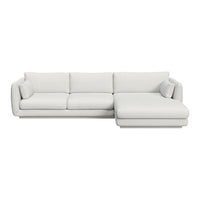 Light gray modern sectional sofa with a smooth, minimalist design and plush cushions. Perfect for contemporary living spaces.