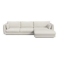 Light beige sectional sofa with a modern minimalist design and smooth, textured upholstery. Perfect for any living space.