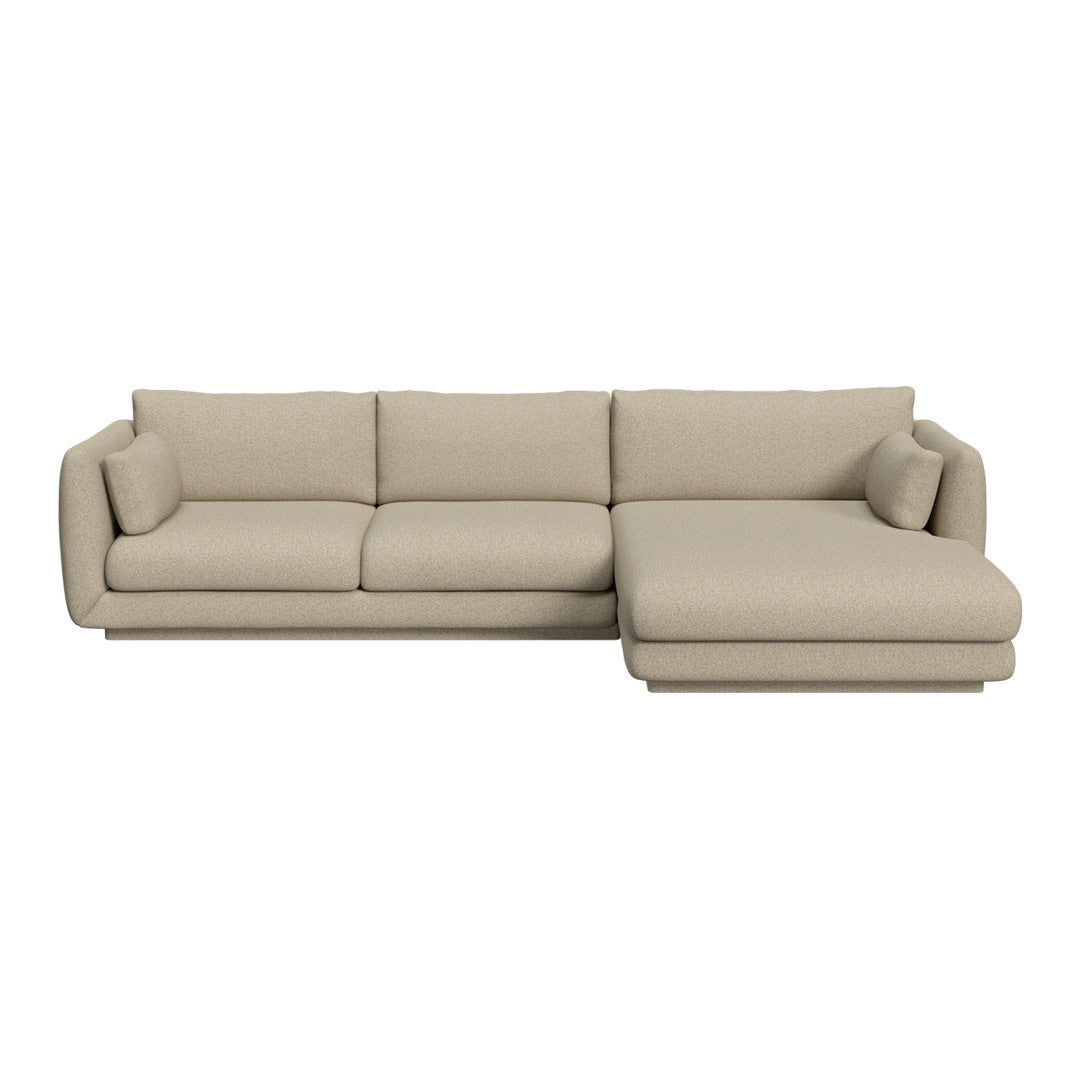 Beige sectional sofa with a smooth, minimalist design and plush cushions for modern living spaces.