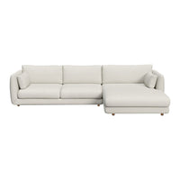 Light gray sectional sofa with smooth leather upholstery and minimalist design, featuring soft lines and no visible patterns.