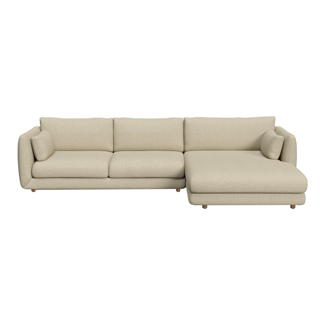 Beige L-shaped sofa with smooth texture, featuring clean lines and subtle, modern design for versatile decor.