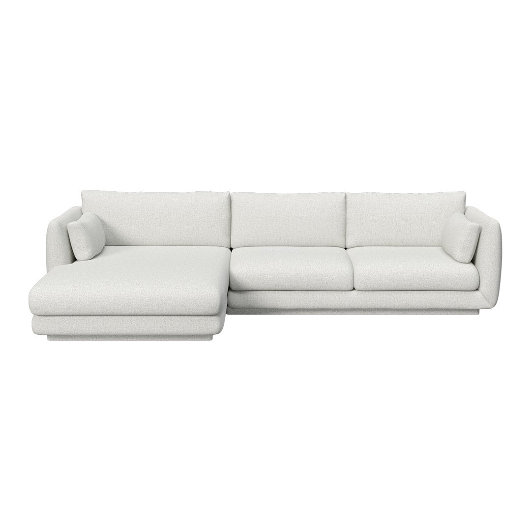 Modern white sectional sofa with a sleek, minimalist design and smooth fabric. Perfect for contemporary living spaces.